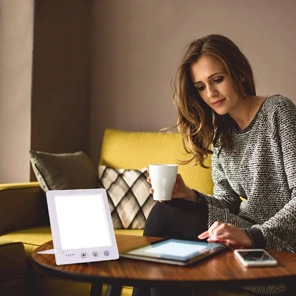 lady using her tablet next to Moodozi